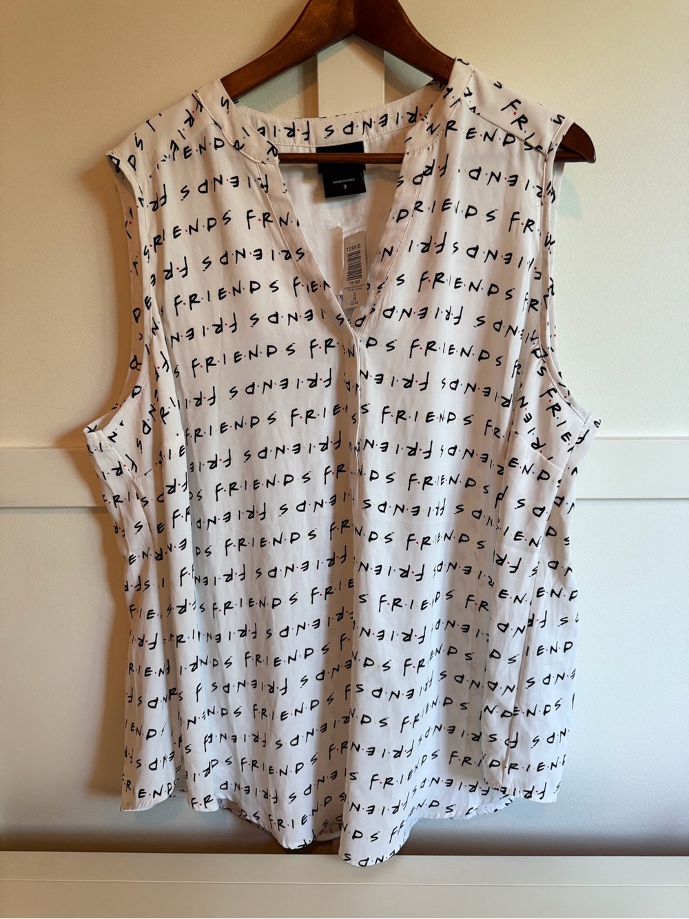 torrid White Sleeveless 'FRIENDS' Script V-Neck Blouse
